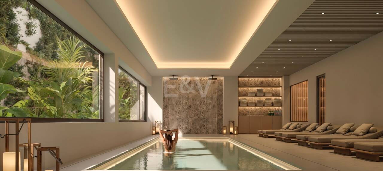 Casa en planta baja con oasis privado de estilo tropical