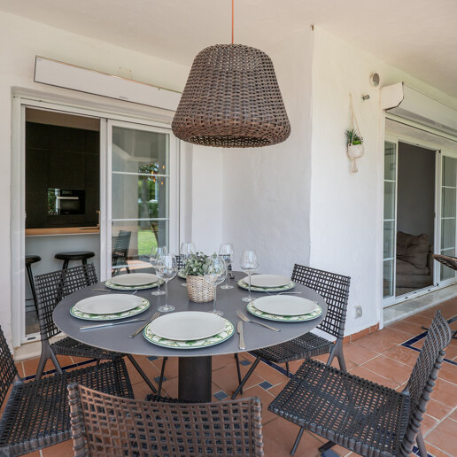 Beachfront Corner Apartment with Expansive Garden in Premier Gated Community