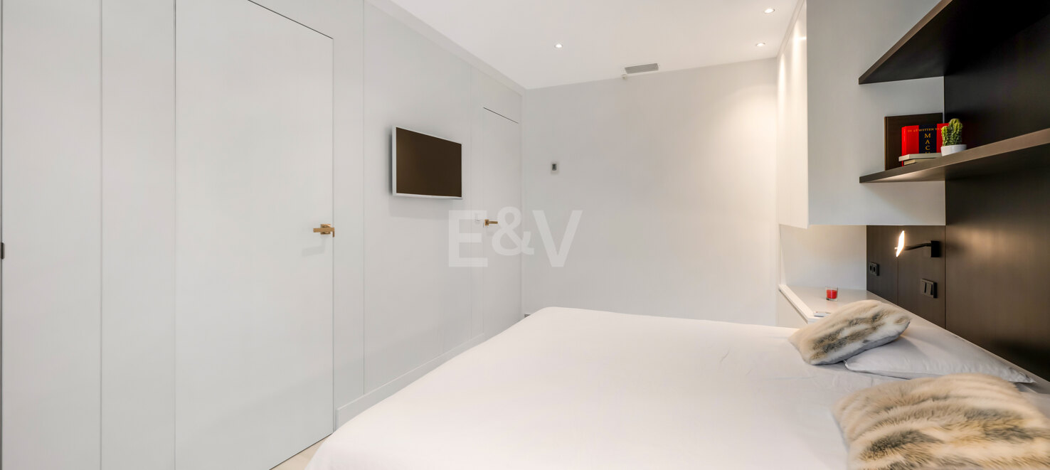 Beachfront Corner Apartment with Expansive Garden in Premier Gated Community