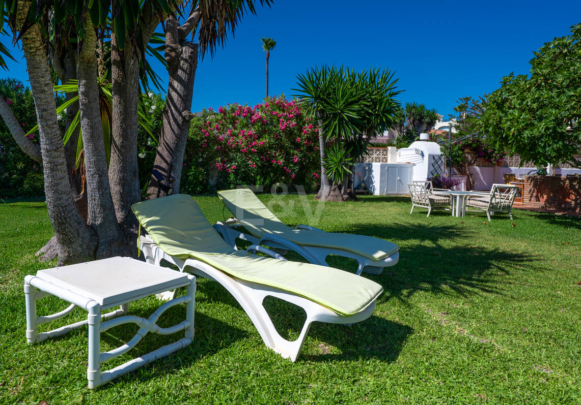 Coastal Charm: Seafront Villa with Stunning Views and Lush Gardens, All on a Single Level
