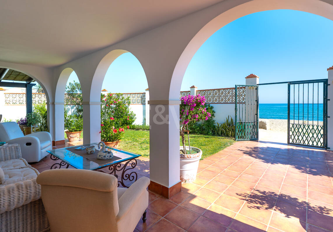 Coastal Charm: Seafront Villa with Stunning Views and Lush Gardens, All on a Single Level