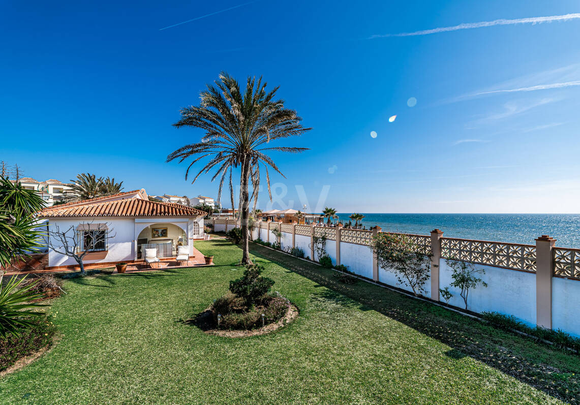 Coastal Charm: Seafront Villa with Stunning Views and Lush Gardens, All on a Single Level