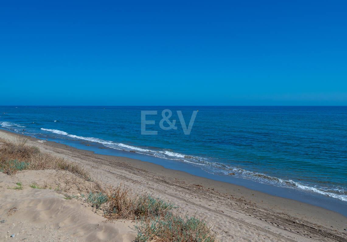Coastal Charm: Seafront Villa with Stunning Views and Lush Gardens, All on a Single Level