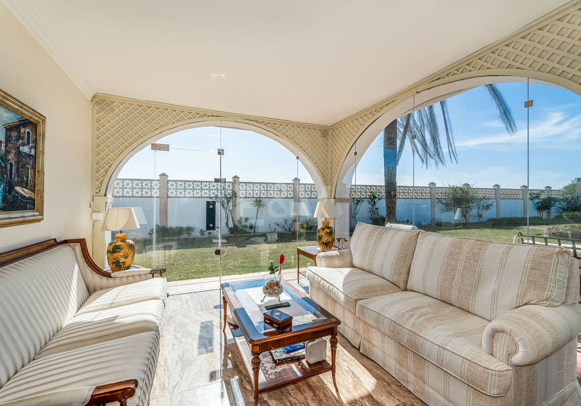 Coastal Charm: Seafront Villa with Stunning Views and Lush Gardens, All on a Single Level