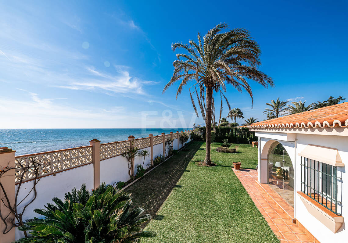 Coastal Charm: Seafront Villa with Stunning Views and Lush Gardens, All on a Single Level