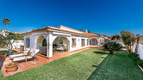 Coastal Charm: Seafront Villa with Stunning Views and Lush Gardens, All on a Single Level