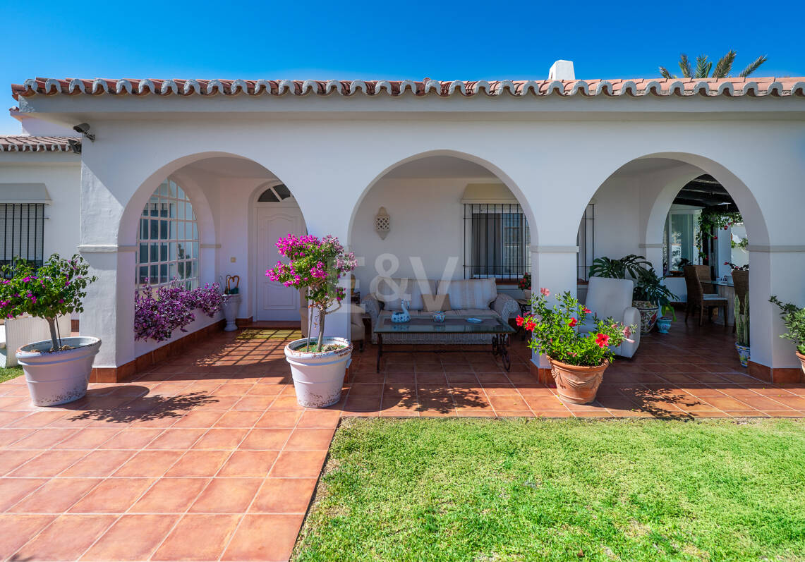 Coastal Charm: Seafront Villa with Stunning Views and Lush Gardens, All on a Single Level