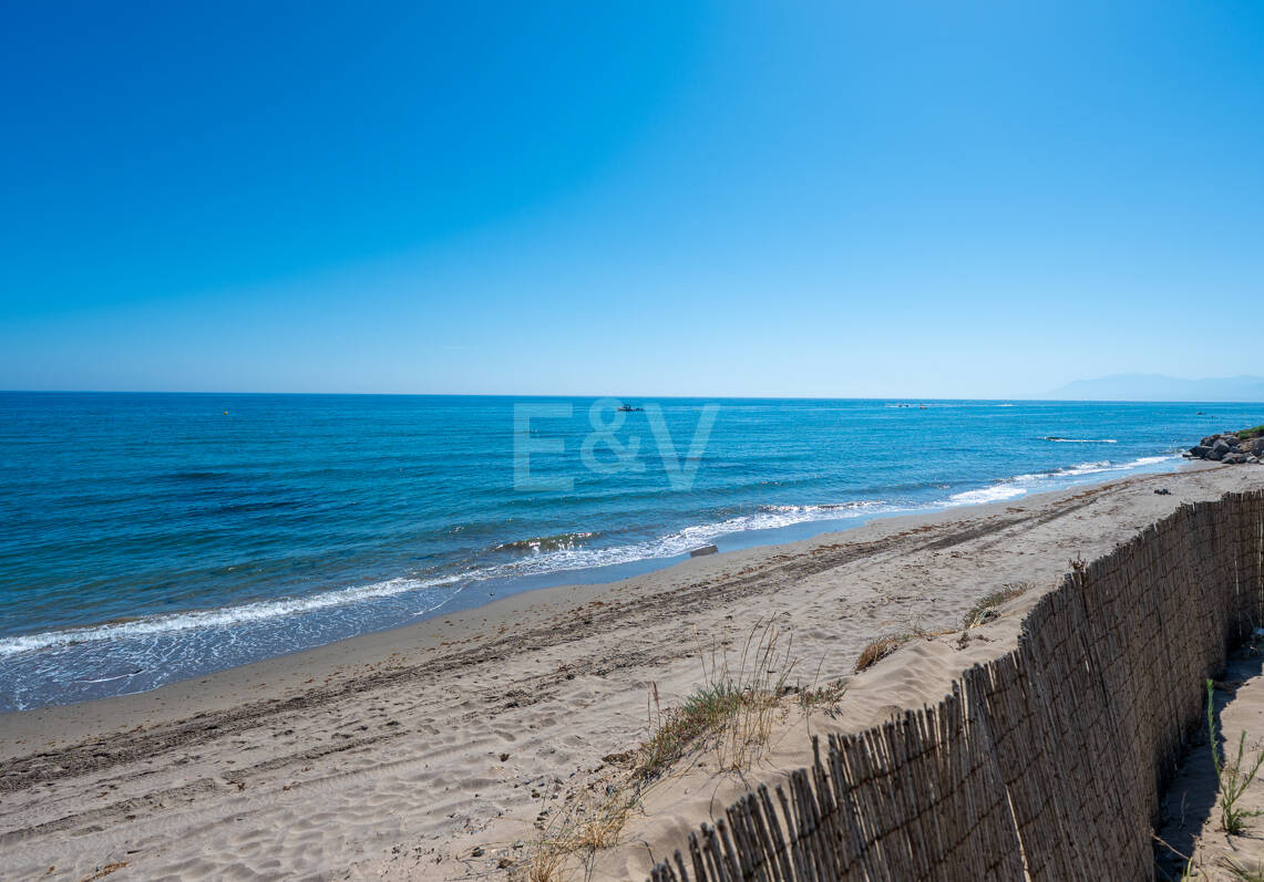 Coastal Charm: Seafront Villa with Stunning Views and Lush Gardens, All on a Single Level