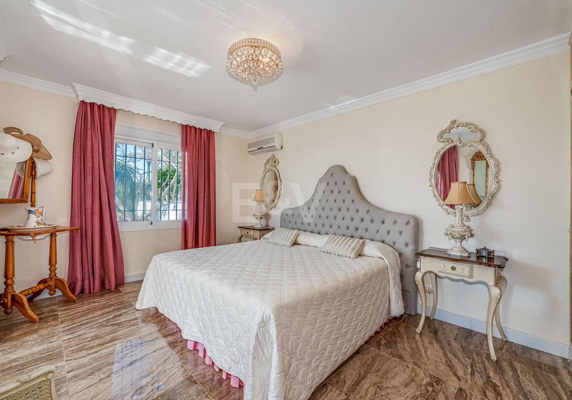 Coastal Charm: Seafront Villa with Stunning Views and Lush Gardens, All on a Single Level