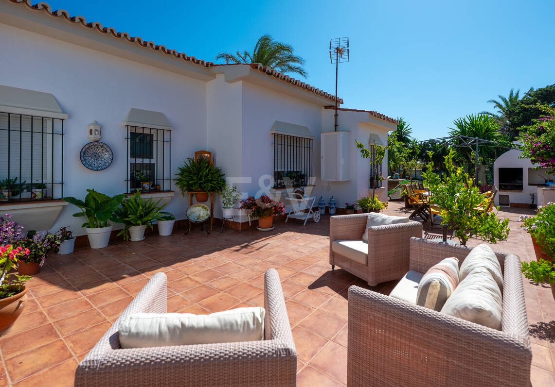 Coastal Charm: Seafront Villa with Stunning Views and Lush Gardens, All on a Single Level