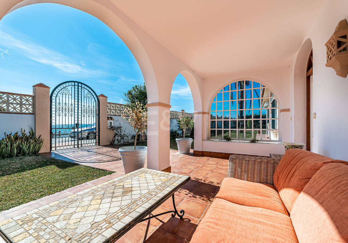 Coastal Charm: Seafront Villa with Stunning Views and Lush Gardens, All on a Single Level