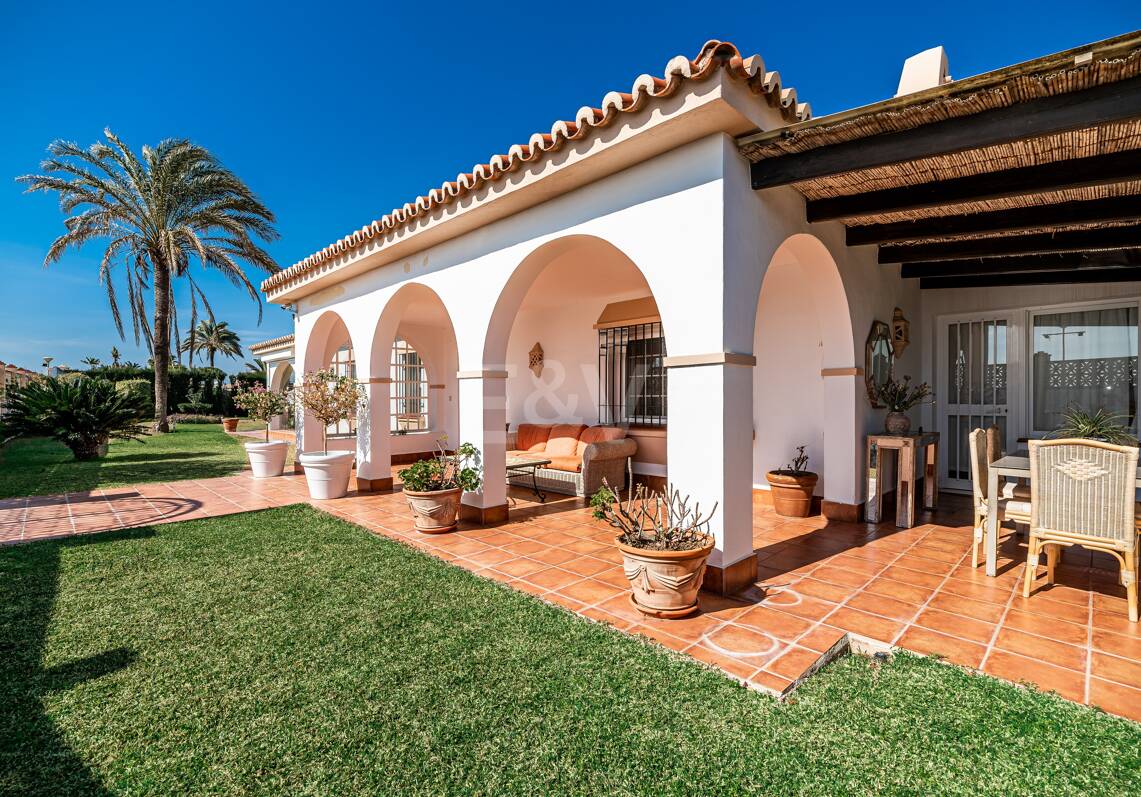 Coastal Charm: Seafront Villa with Stunning Views and Lush Gardens, All on a Single Level