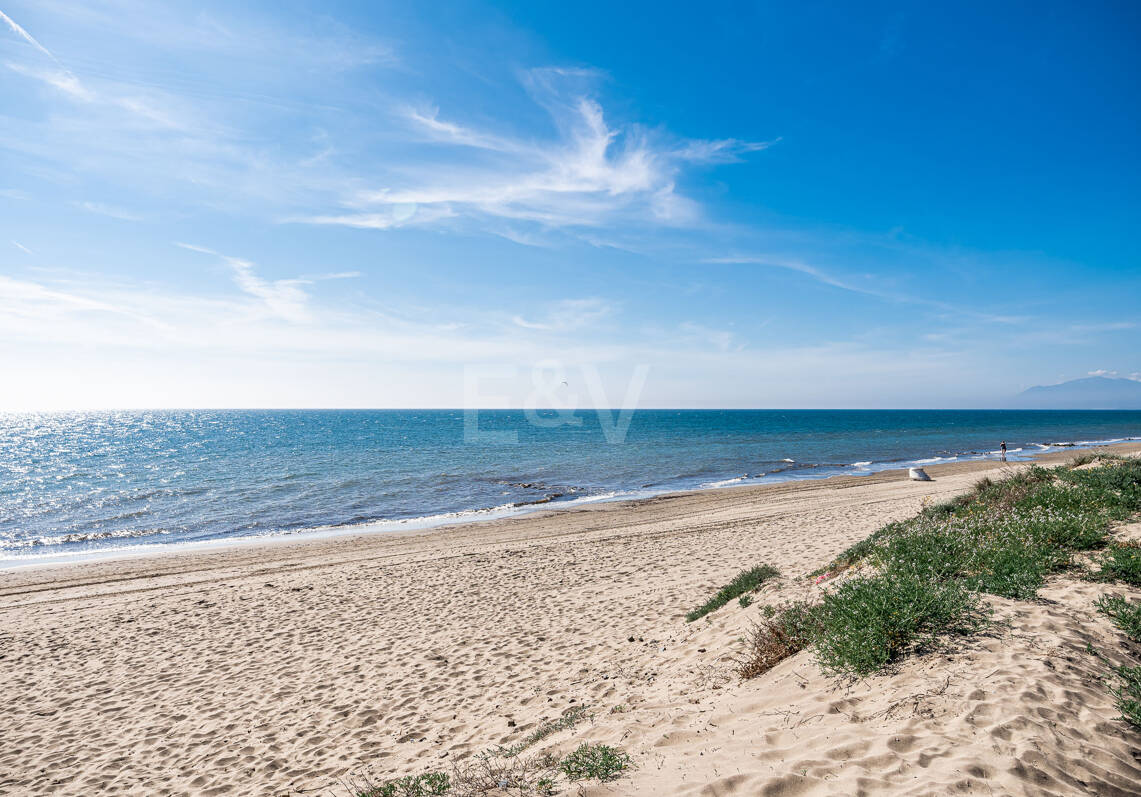 Coastal Charm: Seafront Villa with Stunning Views and Lush Gardens, All on a Single Level
