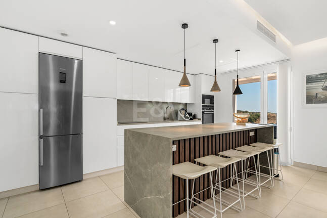 Elegant Duplex Penthouse with Beautiful Sea Views in Sought-After Gated Community