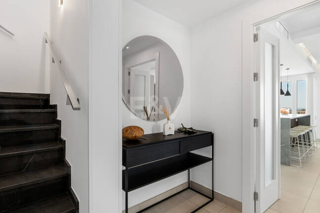 Elegant Duplex Penthouse with Beautiful Sea Views in Sought-After Gated Community