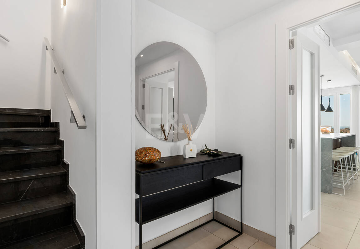 Elegant Duplex Penthouse with Beautiful Sea Views in Sought-After Gated Community