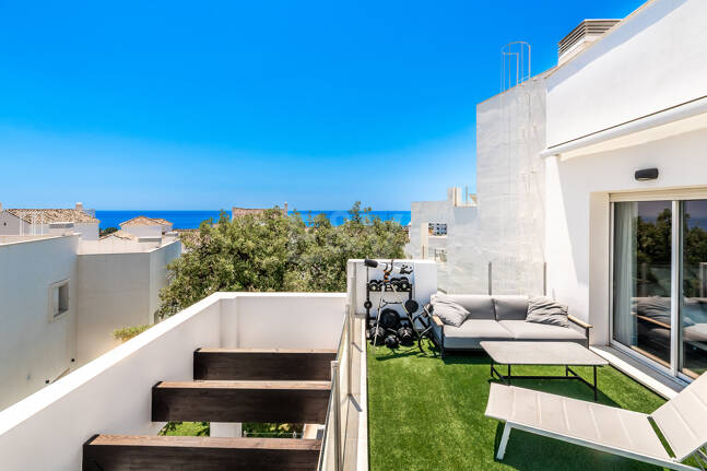 Elegant Duplex Penthouse with Beautiful Sea Views in Sought-After Gated Community