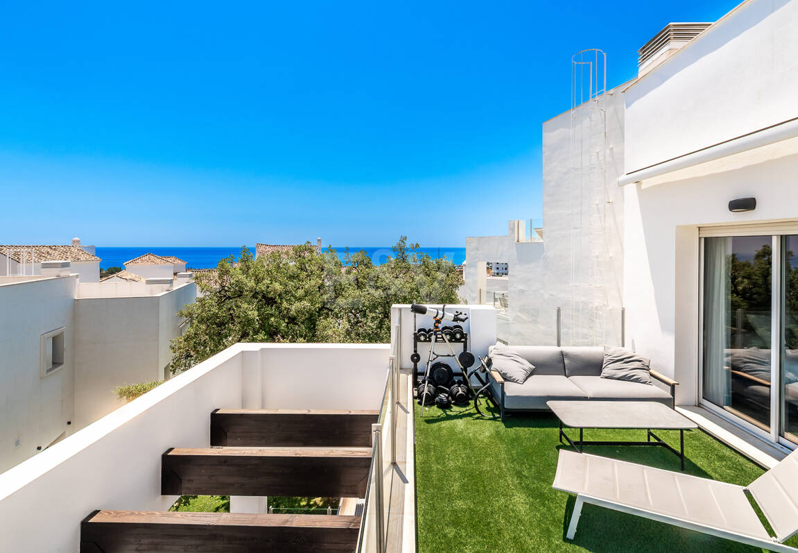 Elegant Duplex Penthouse with Beautiful Sea Views in Sought-After Gated Community