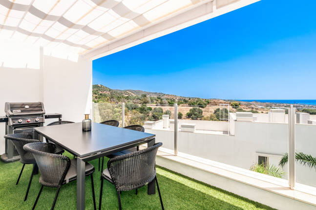 Elegant Duplex Penthouse with Beautiful Sea Views in Sought-After Gated Community