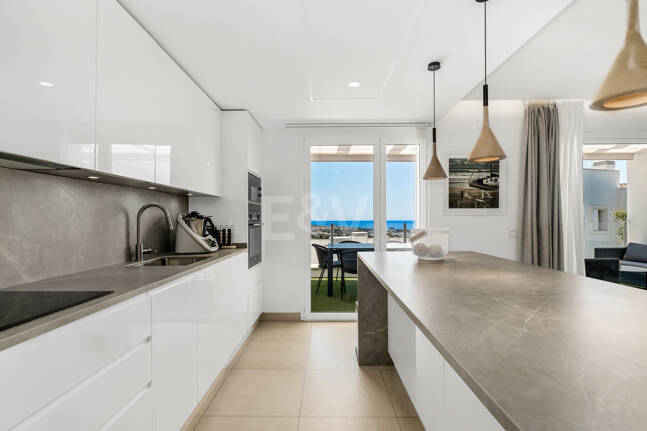 Elegant Duplex Penthouse with Beautiful Sea Views in Sought-After Gated Community