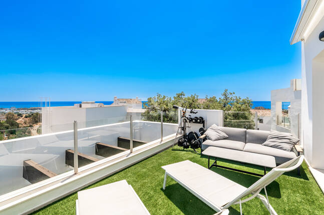 Elegant Duplex Penthouse with Beautiful Sea Views in Sought-After Gated Community