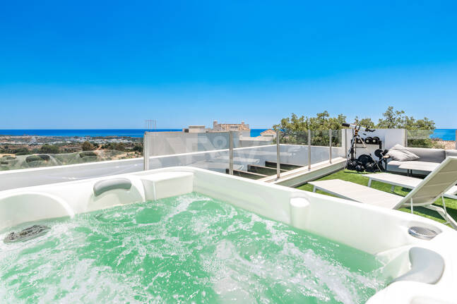 Elegant Duplex Penthouse with Beautiful Sea Views in Sought-After Gated Community