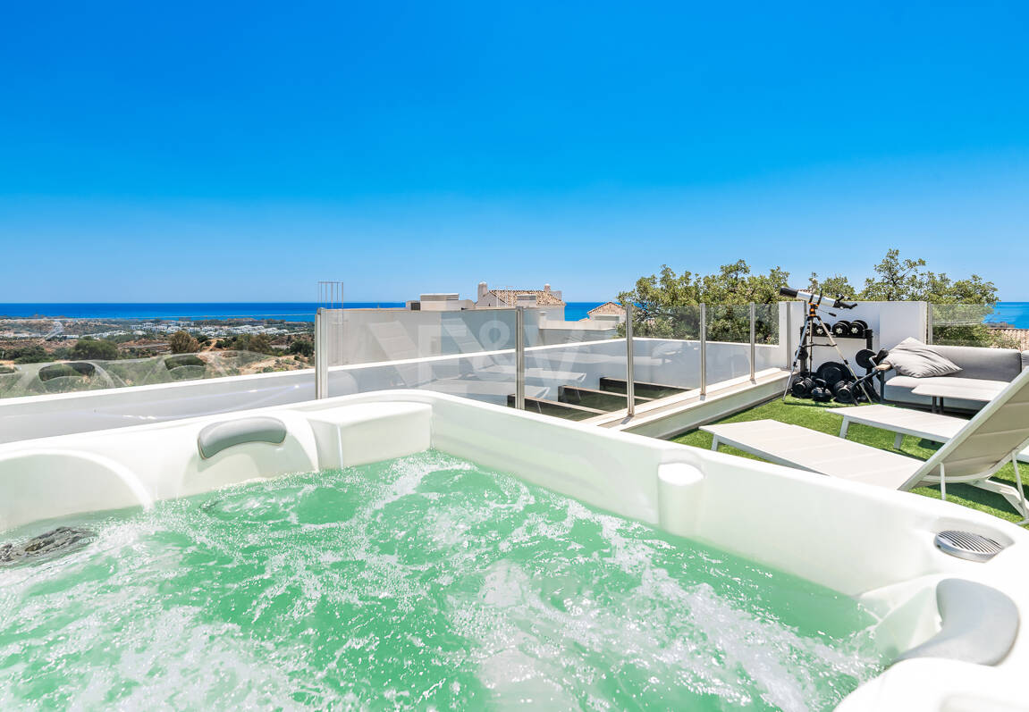 Elegant Duplex Penthouse with Beautiful Sea Views in Sought-After Gated Community