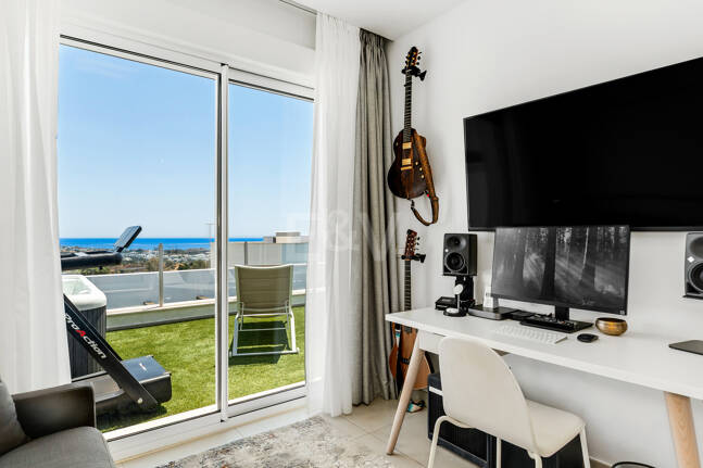 Elegant Duplex Penthouse with Beautiful Sea Views in Sought-After Gated Community