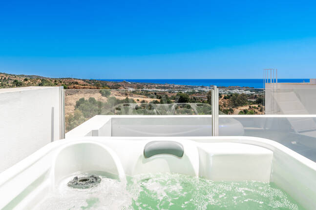 Elegant Duplex Penthouse with Beautiful Sea Views in Sought-After Gated Community