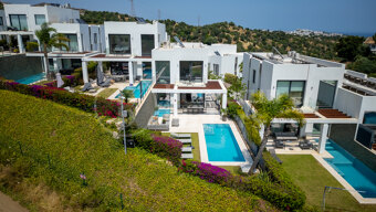 Villa Solmar - Parhus till salu i Green Hill Marbella med havs- och golfutsikt