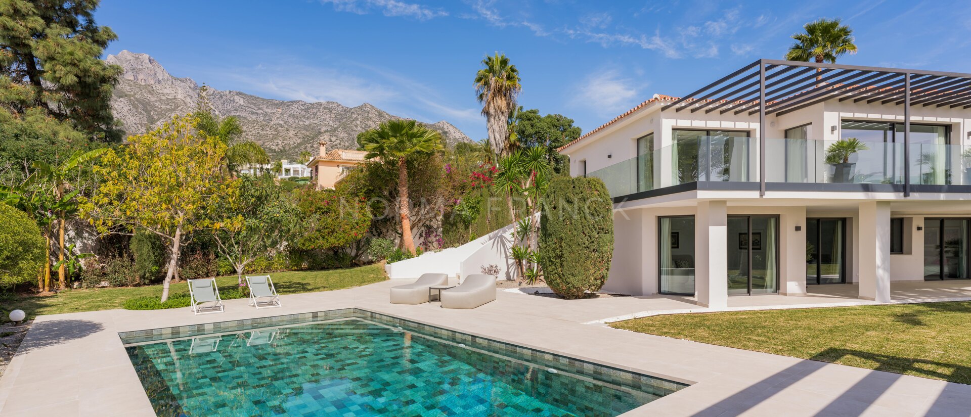 African View - Set in Nagüeles, moments from Marbella’s Golden Mile, this villa offers open views to the Mediterranean