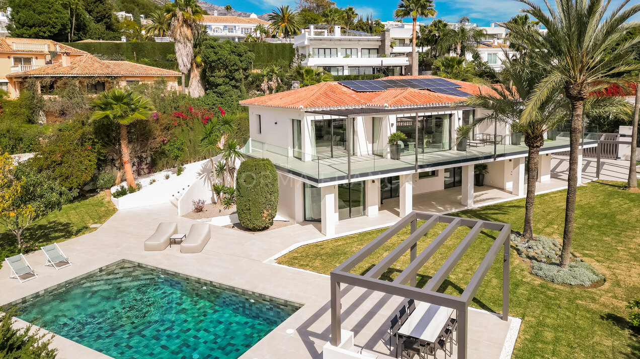 African View - Set in Nagüeles, moments from Marbella’s Golden Mile, this villa offers open views to the Mediterranean
