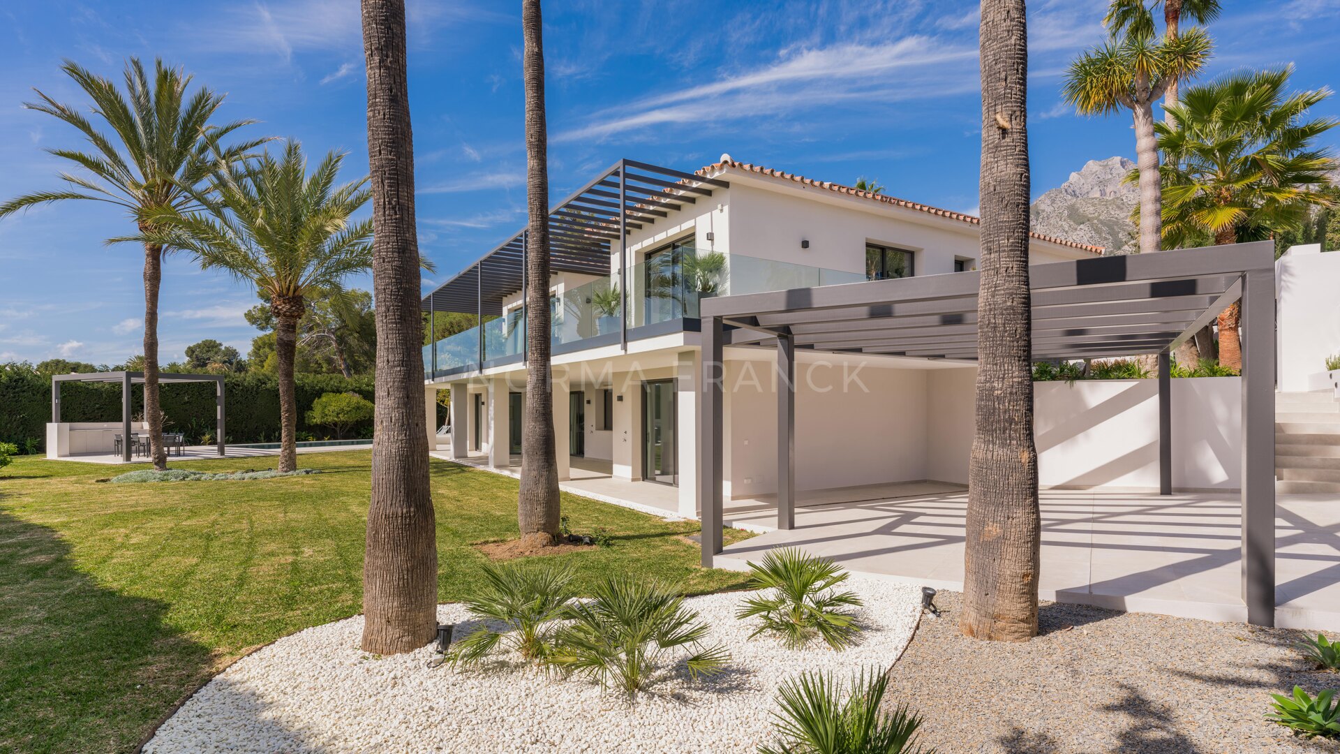 African View - Set in Nagüeles, moments from Marbella’s Golden Mile, this villa offers open views to the Mediterranean