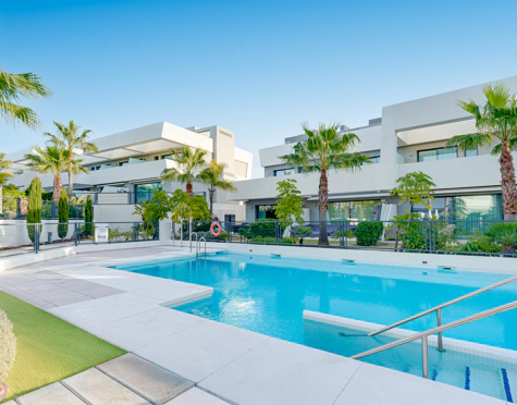 CONTEMPORARY 4-BEDROOM TOWNHOUSE WITH ROOFTOP POOL IN LA CALA DE MIJAS