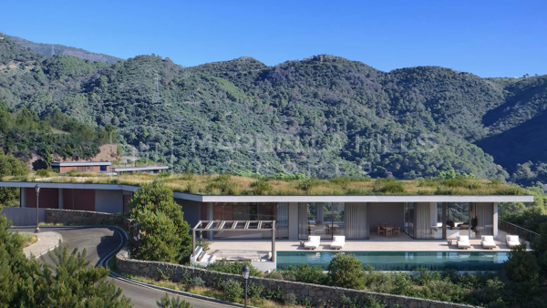 Refugio Contemporáneo en la Montaña con Vistas Panorámicas al Mar y a las Cumbres – Monte Mayor