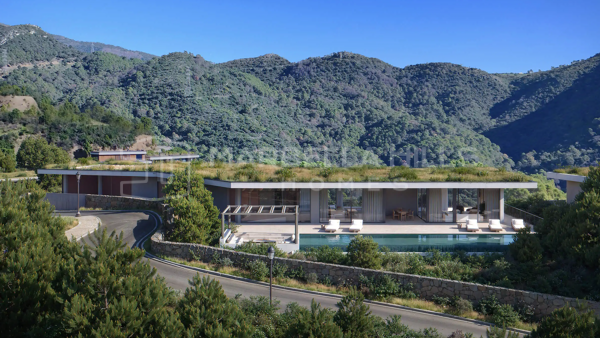 Refugio Contemporáneo en la Montaña con Vistas Panorámicas al Mar y a las Cumbres – Monte Mayor