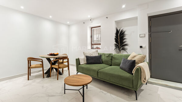 Renovated Townhouse for Sale in Estepona Old Town with Rooftop Terrace