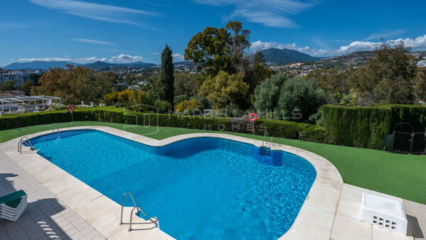 Charming Townhouse for Sale in Aloha Pueblo, Nueva Andalucía | Panoramic Views & Rooftop Solarium