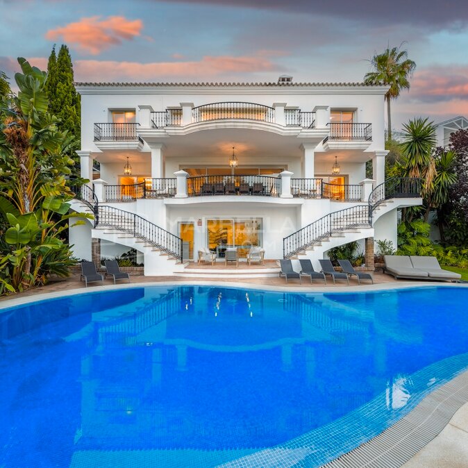 Luxury Golf-Front Villa for Sale in El Herrojo, Benahavís with Mountain Views, Spa and Entertainment Level