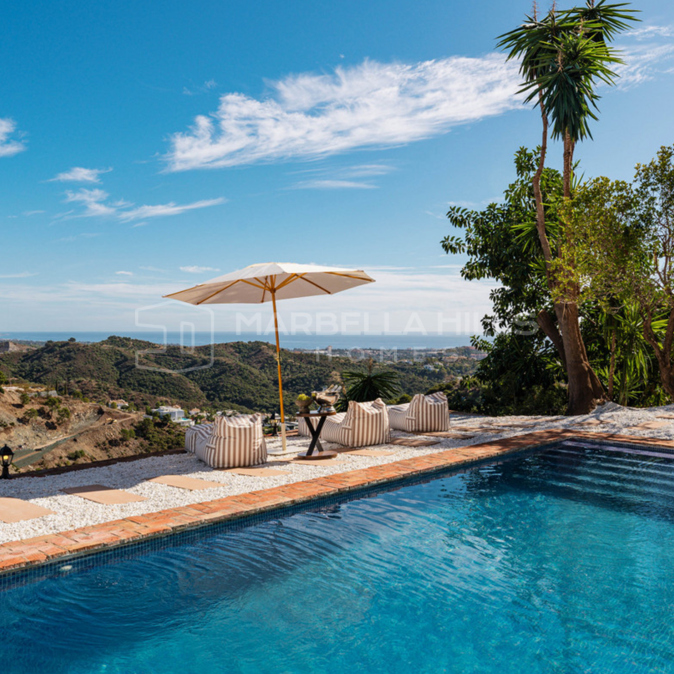 Elegant Andalusian Villa with Panoramic Sea and Mountain Views in El Madroñal, Benahavís