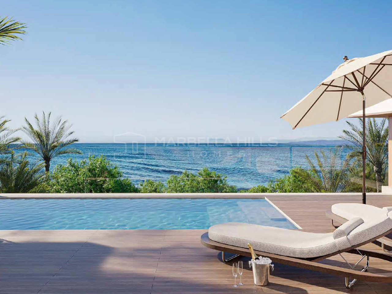 Áticos en primera línea de playa en venta en Estepona con vistas al mar y terrazas en la azotea