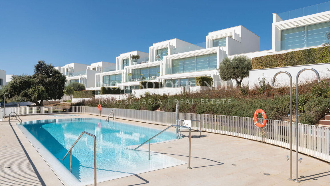 Frontline golf semi-detached villa with sea views for sale in La Reserva Sotogrande