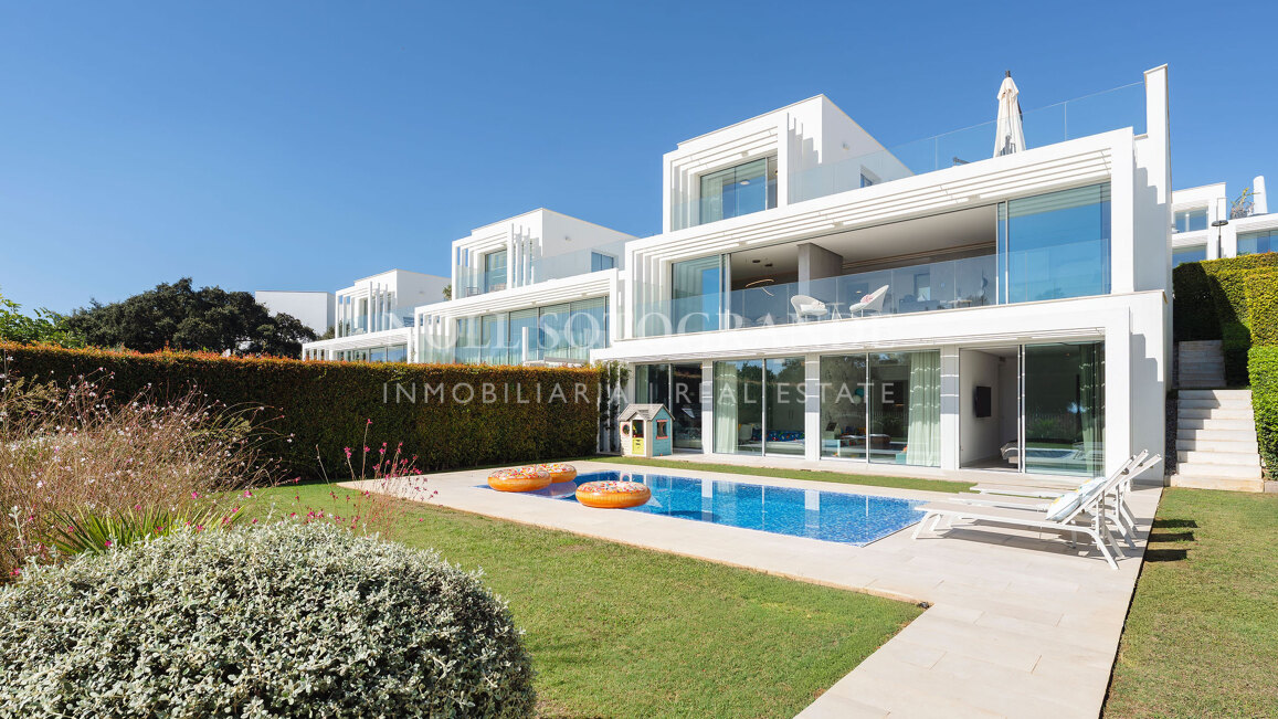 Frontline golf semi-detached villa with sea views for sale in La Reserva Sotogrande