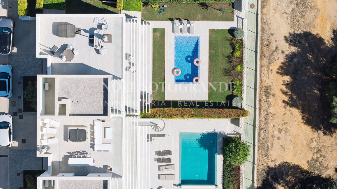 Frontline golf semi-detached villa with sea views for sale in La Reserva Sotogrande