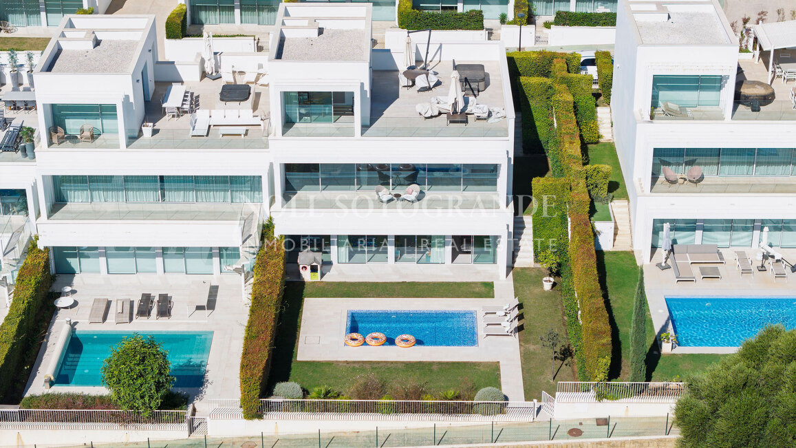 Frontline golf semi-detached villa with sea views for sale in La Reserva Sotogrande