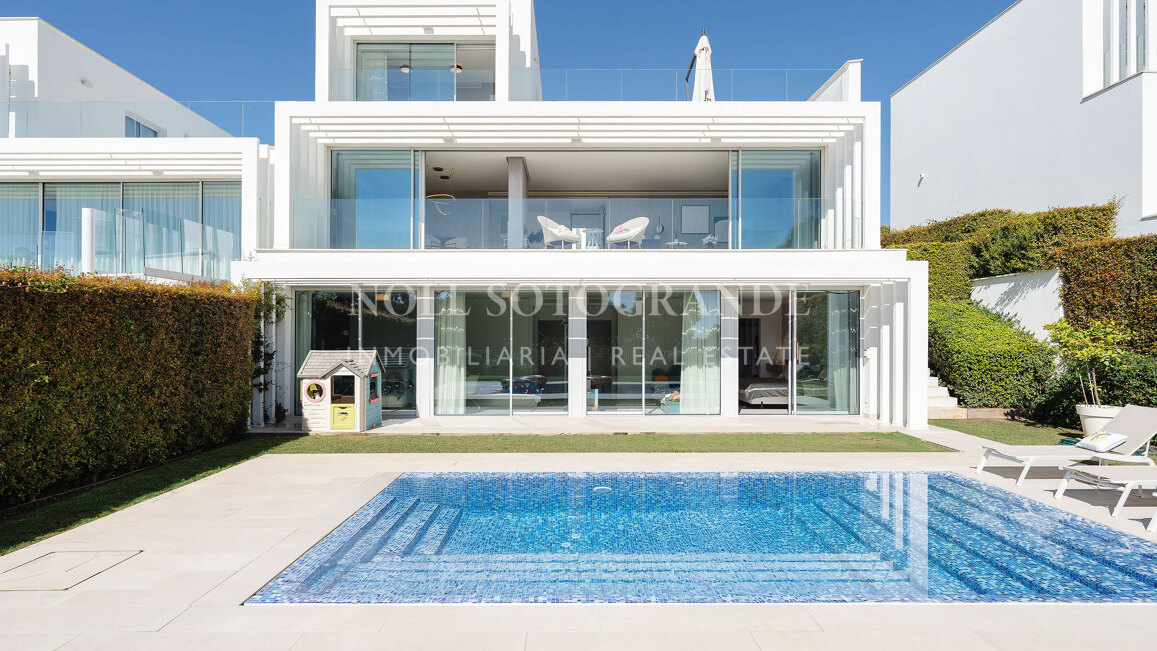 Frontline golf semi-detached villa with sea views for sale in La Reserva Sotogrande