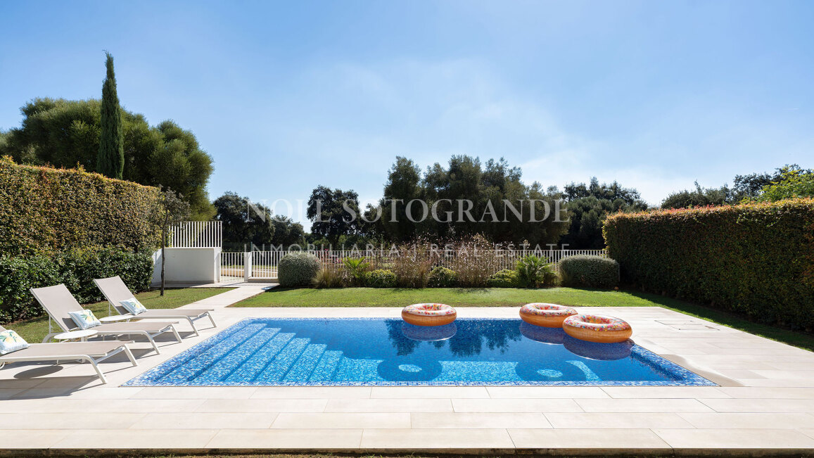 Frontline golf semi-detached villa with sea views for sale in La Reserva Sotogrande