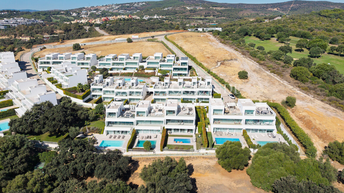 Frontline golf semi-detached villa with sea views for sale in La Reserva Sotogrande