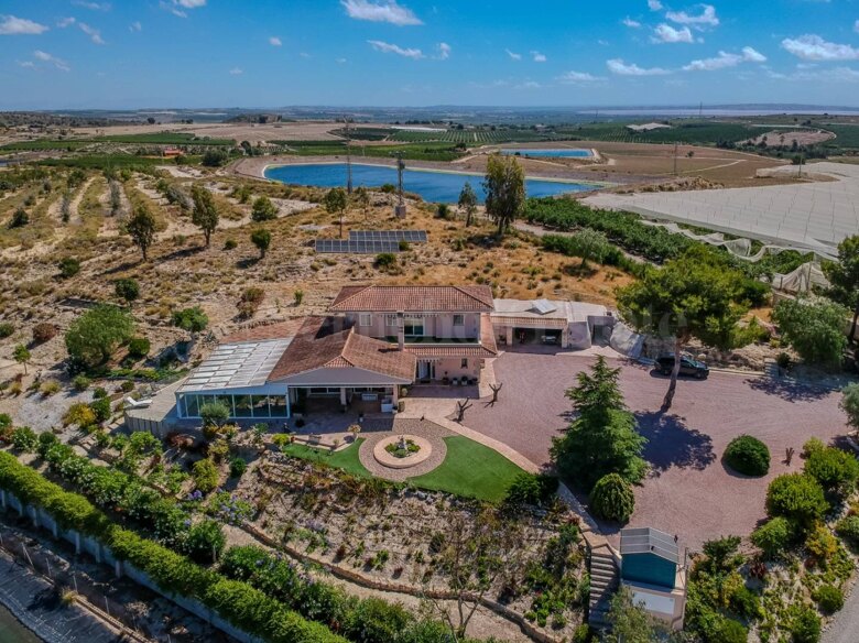 Country charm meets modern luxury, complete with a year-round heated pool, private stables, and endless Mediterranean sunshine.