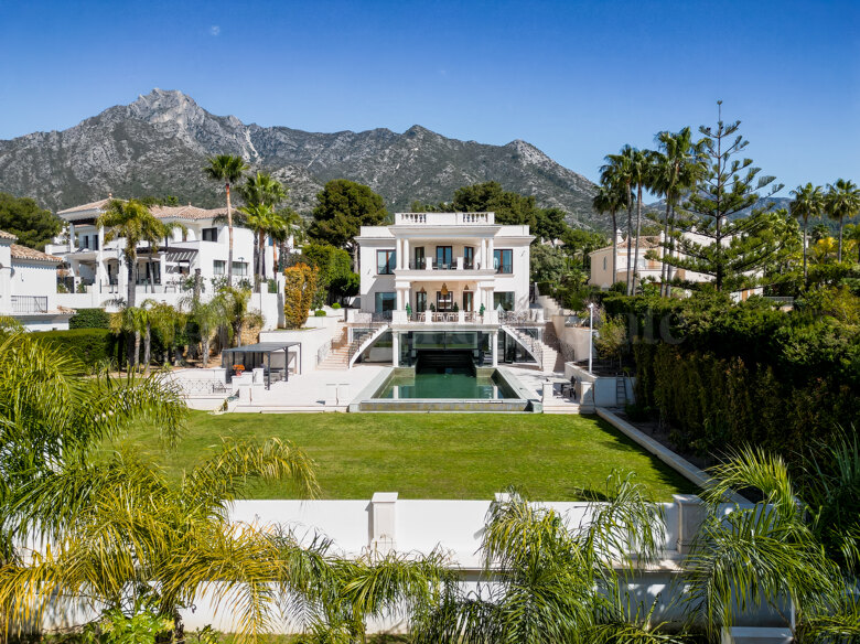Villa Isolde is an exceptional contemporary residence located within the prestigious gated community of Sierra Blanca